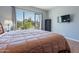 Main bedroom with backyard view and large window at 5363 S Emerald Desert Dr, Gold Canyon, AZ 85118