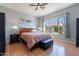 Spacious main bedroom with wood flooring and large window at 5363 S Emerald Desert Dr, Gold Canyon, AZ 85118