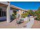 Cozy patio with seating area and built-in grill at 5363 S Emerald Desert Dr, Gold Canyon, AZ 85118