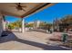 Covered patio with seating area and built-in grill at 5363 S Emerald Desert Dr, Gold Canyon, AZ 85118