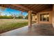 Large covered patio overlooking a grassy backyard at 551 S Esquire Way, Mesa, AZ 85202