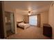 Spacious bedroom with access to bathroom and large windows at 551 S Esquire Way, Mesa, AZ 85202