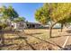 Yard with swing set and mature trees at 5715 N 105Th Ln, Glendale, AZ 85307