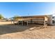 Small barn with covered stalls for animals at 5715 N 105Th Ln, Glendale, AZ 85307