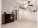 Spacious bedroom with carpeted floors and a ceiling fan at 5715 N 105Th Ln, Glendale, AZ 85307