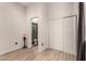 Well-lit bedroom with en-suite bathroom and sliding door closet at 5715 N 105Th Ln, Glendale, AZ 85307
