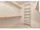 Spacious closet with shelving and hanging rods for ample storage at 5715 N 105Th Ln, Glendale, AZ 85307