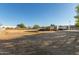 Large lot with dry grass and RV parking at 5715 N 105Th Ln, Glendale, AZ 85307