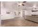 Bright living room with hardwood floors and neutral walls at 5715 N 105Th Ln, Glendale, AZ 85307