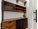 Built-in pantry with wood shelving and metal accents at 5715 N 105Th Ln, Glendale, AZ 85307