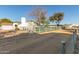 Side yard with chain link fence and dirt area at 5715 N 105Th Ln, Glendale, AZ 85307