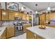 Spacious kitchen with island, stainless steel appliances, and ample cabinetry at 6512 E Hacienda La Noria Ln, Gold Canyon, AZ 85118