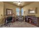 Home office with wooden desk, chair, and cabinets at 6512 E Hacienda La Noria Ln, Gold Canyon, AZ 85118