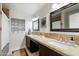 Double vanity bathroom with granite countertops at 7032 E Dreyfus Ave, Scottsdale, AZ 85254