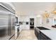 Modern kitchen featuring stainless steel appliances and white cabinetry at 7032 E Dreyfus Ave, Scottsdale, AZ 85254