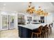 Updated kitchen with a center island and stainless steel appliances at 7032 E Dreyfus Ave, Scottsdale, AZ 85254