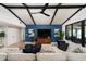 Open living area with sectional sofa, high ceilings, and modern decor at 7032 E Dreyfus Ave, Scottsdale, AZ 85254