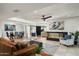 Spacious living area featuring a fireplace and ample natural light at 7032 E Dreyfus Ave, Scottsdale, AZ 85254