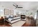 Main bedroom with a fireplace and hardwood floors at 7032 E Dreyfus Ave, Scottsdale, AZ 85254