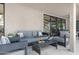 Relaxing patio furniture with grey couches and coffee table at 7032 E Dreyfus Ave, Scottsdale, AZ 85254