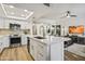 Modern kitchen with island, stainless steel appliances, and white cabinets at 9705 E Mountain View Rd # 1058, Scottsdale, AZ 85258