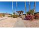 Community entrance with landscaping and signage at 10814 W Thunderbird Blvd, Sun City, AZ 85351