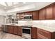 Modern kitchen with ample cabinetry and quartz countertops at 10814 W Thunderbird Blvd, Sun City, AZ 85351