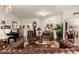 Spacious living room with leather furniture and decorative accents at 10814 W Thunderbird Blvd, Sun City, AZ 85351