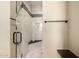 Shower with glass enclosure and built-in seat at 10855 E Elba Way, Scottsdale, AZ 85262