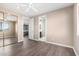 Bedroom with mirrored closet and access to bathroom at 10855 E Elba Way, Scottsdale, AZ 85262