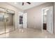 Bedroom with mirrored closet and en-suite bathroom at 10855 E Elba Way, Scottsdale, AZ 85262