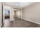 Bedroom with mirrored closet and bathroom access at 10855 E Elba Way, Scottsdale, AZ 85262