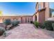 Courtyard entry with tile flooring and desert landscaping at 10855 E Elba Way, Scottsdale, AZ 85262