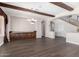 Formal dining room with hardwood floors, wood beams, and built in cabinetry at 10855 E Elba Way, Scottsdale, AZ 85262