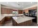 Modern kitchen featuring granite countertops and stainless steel appliances at 10855 E Elba Way, Scottsdale, AZ 85262