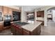 Kitchen island with gas cooktop and ample counter space at 10855 E Elba Way, Scottsdale, AZ 85262