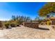 Stone outdoor kitchen with grill and patio at 10855 E Elba Way, Scottsdale, AZ 85262