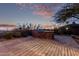 Stone outdoor kitchen with built-in grill at 10855 E Elba Way, Scottsdale, AZ 85262