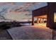 Evening view of patio with pool and hammock at 10855 E Elba Way, Scottsdale, AZ 85262