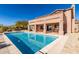 Inviting pool and spa with covered patio at 10855 E Elba Way, Scottsdale, AZ 85262