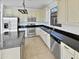 Kitchen with stainless steel appliances and granite countertops at 12037 W Via Del Sol Ct, Sun City, AZ 85373