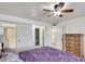 Bedroom with king bed and ensuite bath access at 13232 N 98Th Ave # N, Sun City, AZ 85351