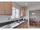 Bright kitchen features ample cabinetry and a double sink at 13232 N 98Th Ave # N, Sun City, AZ 85351