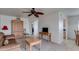 Living room with brown leather couch and wood furniture at 13232 N 98Th Ave # N, Sun City, AZ 85351