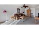 Living room with brown leather couch and wood furniture at 13232 N 98Th Ave # N, Sun City, AZ 85351