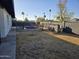 View of the backyard with the pool, surrounding rock landscape and patio space at 1410 E Bishop Dr, Tempe, AZ 85282