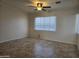 Bright bedroom with blinds on the windows and a ceiling fan for comfort at 1410 E Bishop Dr, Tempe, AZ 85282