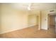 Comfortable bedroom with mirrored closet doors, ceiling fan, and a view of the hallway at 1410 E Bishop Dr, Tempe, AZ 85282