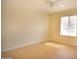 Well-lit bedroom with wood-look floors and a window providing ample natural light at 1410 E Bishop Dr, Tempe, AZ 85282