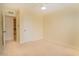 Bedroom featuring carpet, a ceiling fan, and access to an en-suite bathroom at 1410 E Bishop Dr, Tempe, AZ 85282